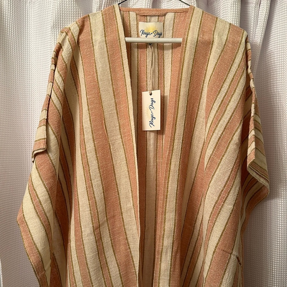 Brand new cover up Rays For Days one size fits all. Never worn.